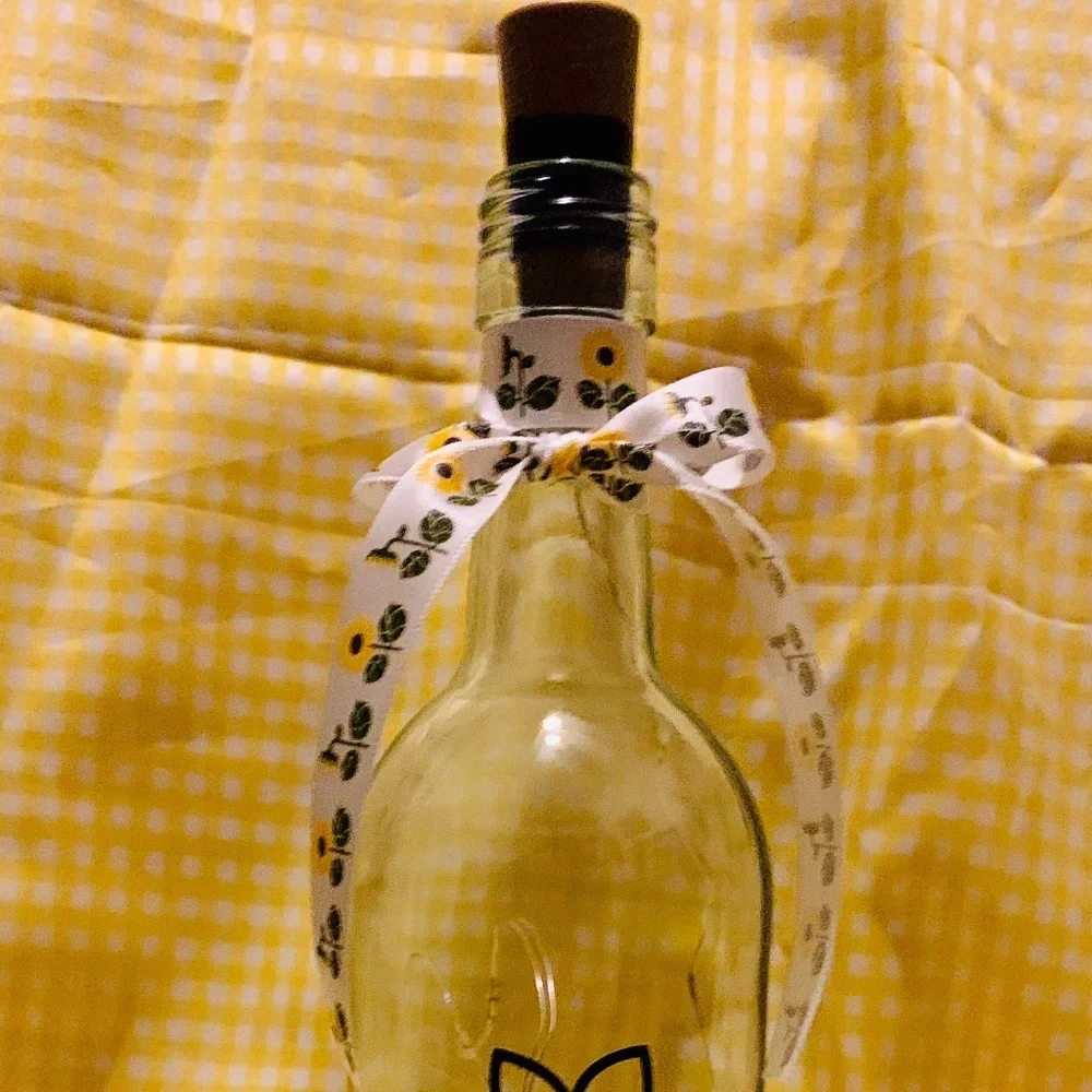 ‘Don’t Stop Beleafing’ logo wine bottle lantern